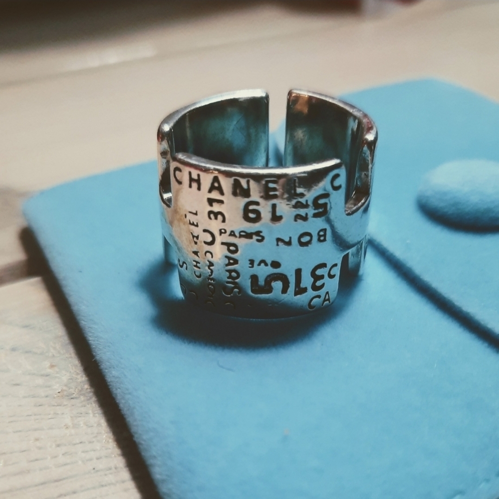 Silver Ring With Engraved Writing. Comes With Tiffany Blue Snap Jewelry Bag